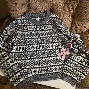 a new day. Black and White Apres SweaterAPRES Winter Style